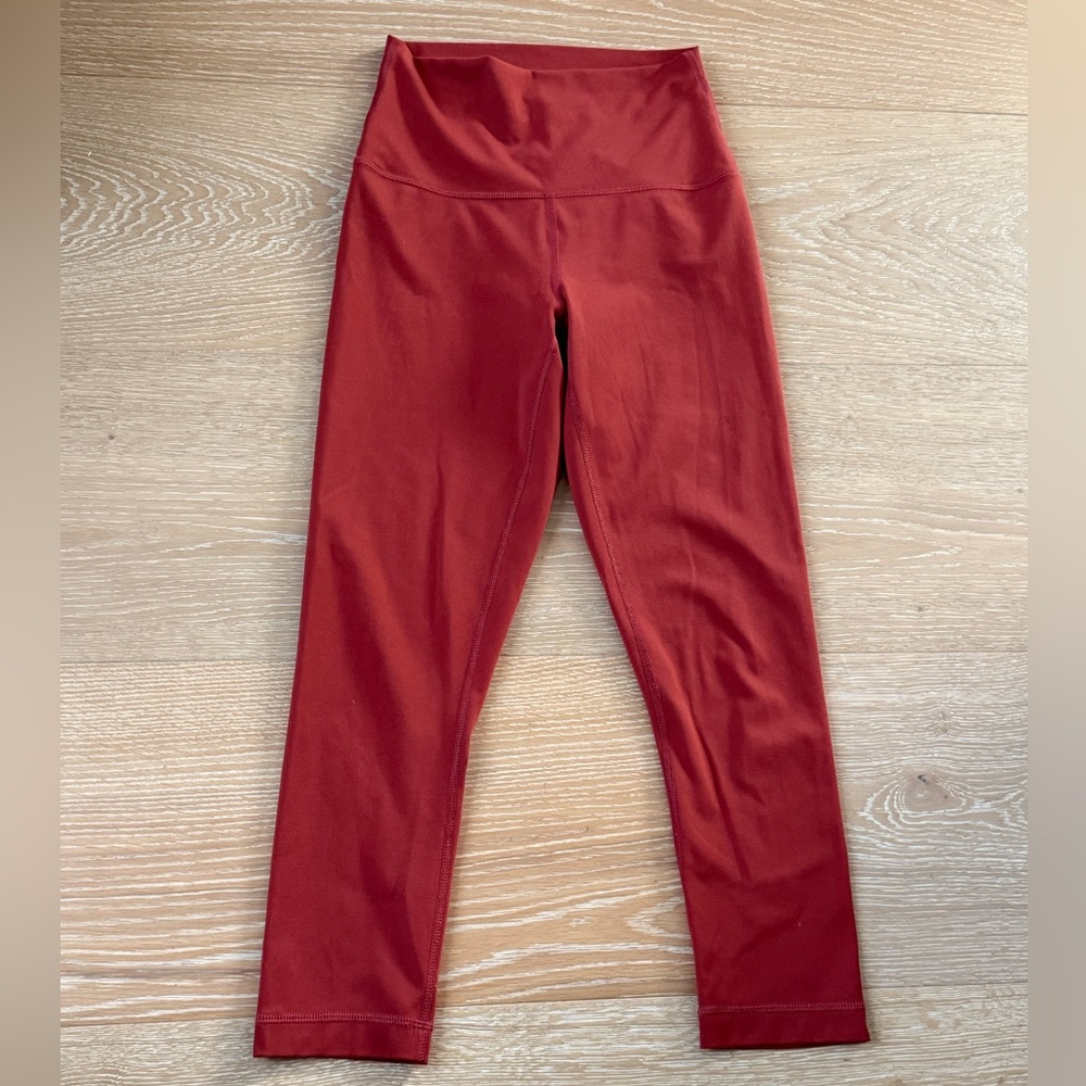 Yogalicios Lux butter soft leggings,  size small in a rust color. 23” inseam